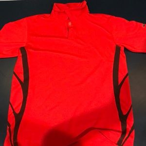 Red and black kids Nike golf shirt